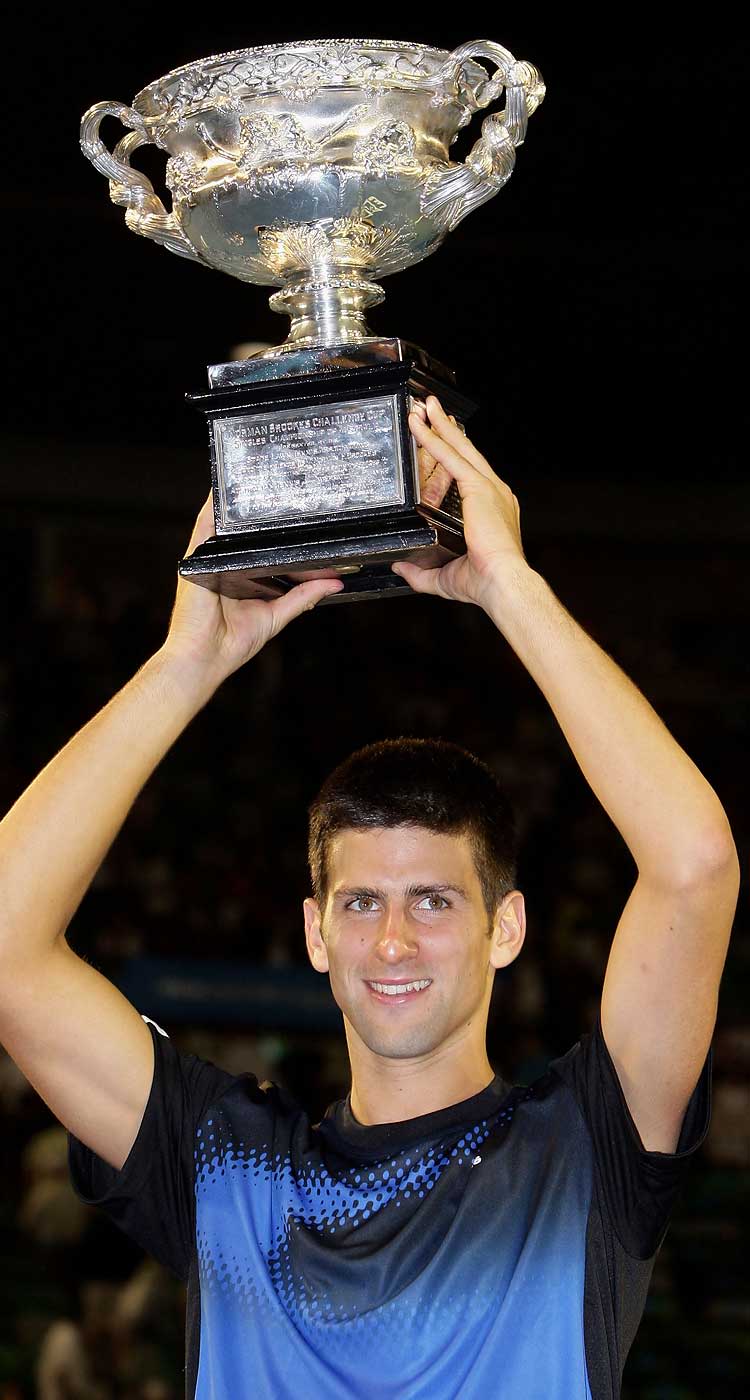 Djokovic lifts his maiden major trophy at the 2008 Australian Open.