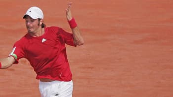 Nicolas Massu in action against Djokovic during the 2006 Amersfoort final.